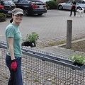 Erynn Planting Her Gutter Garden